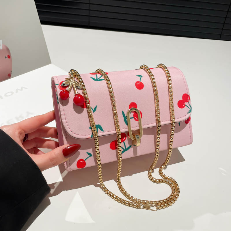 Popularidad transfronteriza pequeña fresca impresión de cereza bolso cuadrado para mujeres 2025 verano nuevo bolso de hombro universal mochila