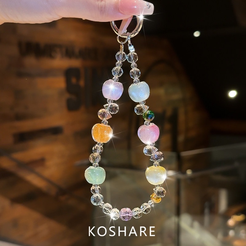 Honey Peach Cat Flash Diamond cadena de teléfonos móviles ligera de lujo nicho de alta calidad bolsos de cristal colgante colgante de mano lindos dibujos animados