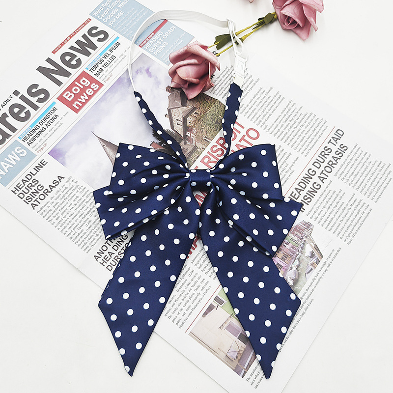 Punto al por mayor de doble capa oblicua pajarita de lunares moda nueva camisa estilo universitario uniforme enorme mango largo cuello JK flor