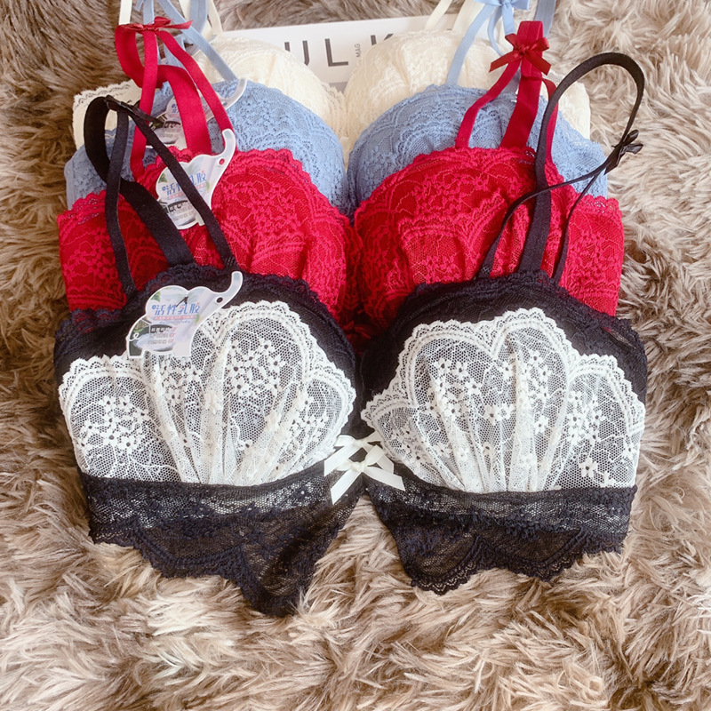 El otoño y el Invierno nuevo encaje sexy ropa interior de las mujeres empuja hacia arriba pequeño sujetador inalámbrico cómodo Palma taza sujetador traje 8255