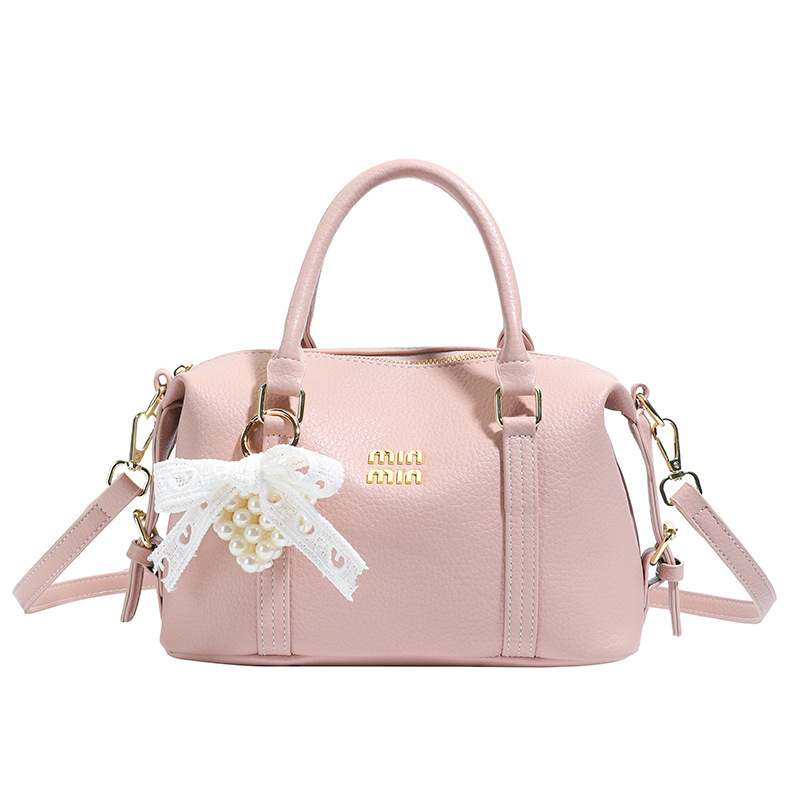 2026 nuevo bolso de bolos de mano de mujer simple sensación cotidiana de nicho de viaje coreano bolso de mujer bolso de almohada