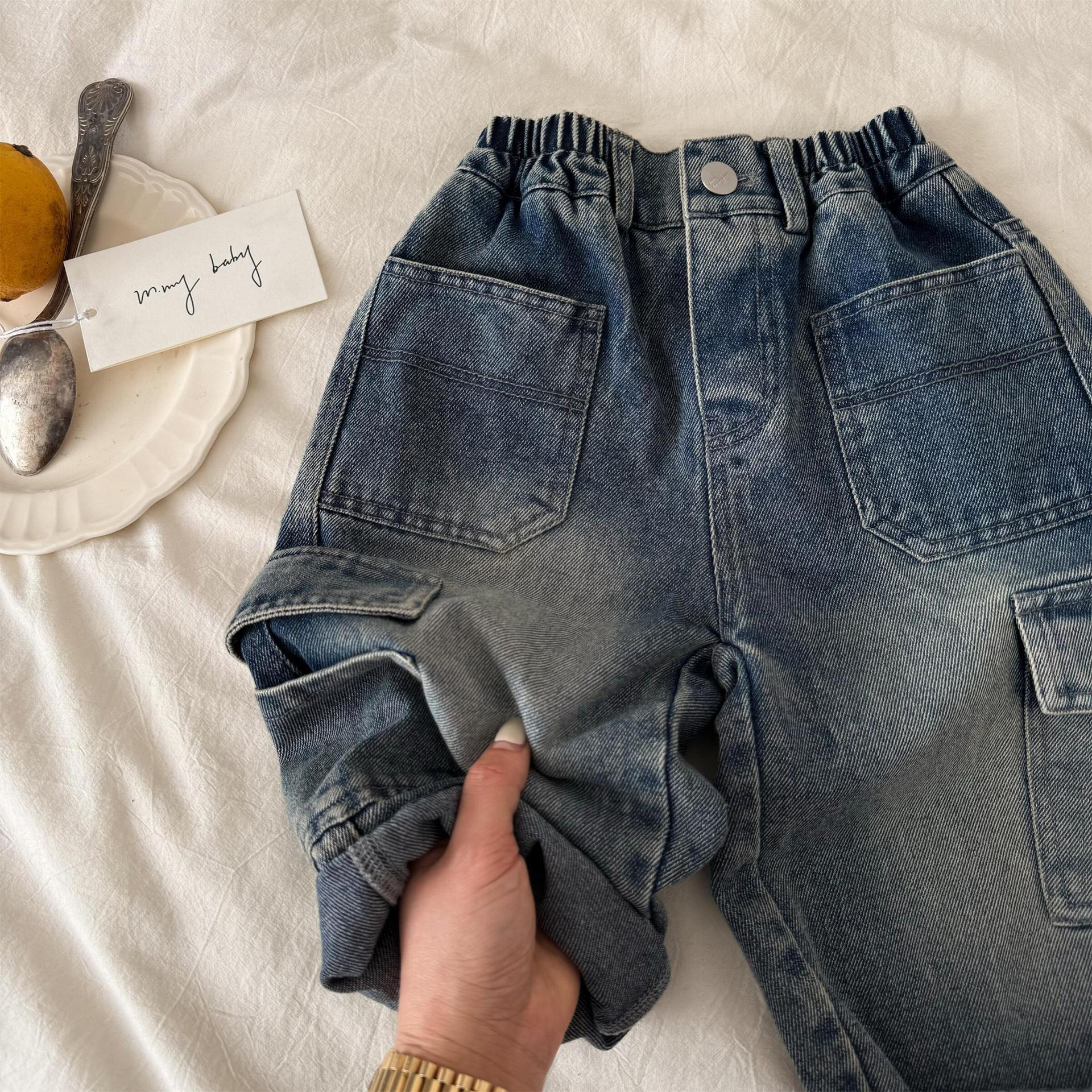 Pantalones largos infantiles primavera 2025, nuevos jeans unisex de color sólido con bolsillos, pantalones cargo rectos para bebé