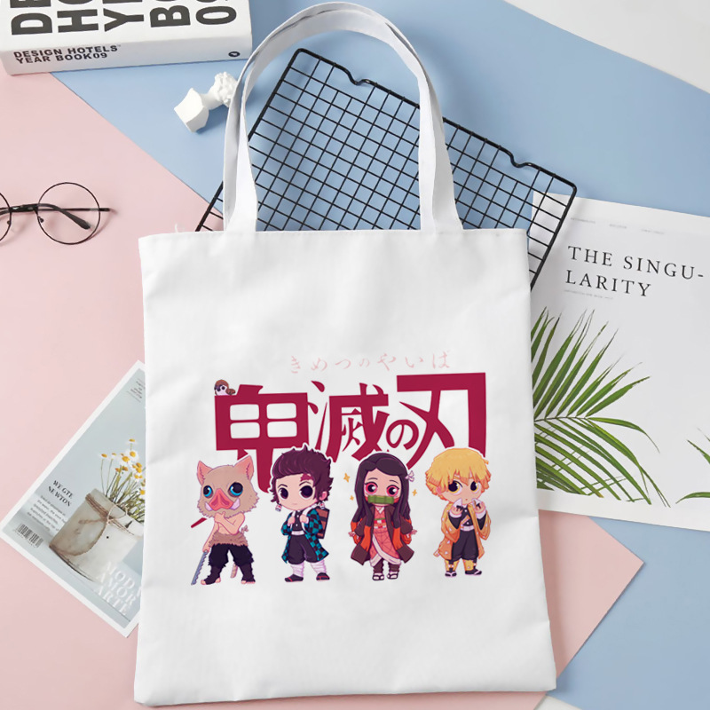 Comercio exterior transfronterizo Demon Slayer impresa bolsa de lona Harjuku bolsa de hombro bolsa de compras portátil de moda para estudiantes