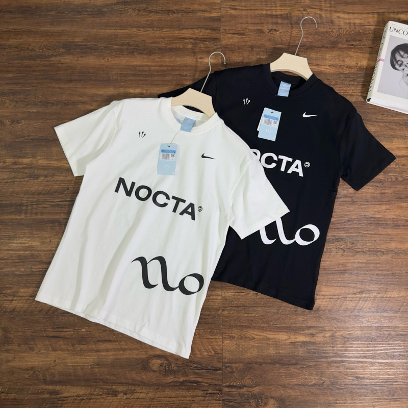 NOCTA Joint Spring Large Letter Printing Digital Pure Cotton Casual Sports Short-sleeved T-shirt for Men and Women NOCTA Joint Spring Large Letter Printing Digital Pure Cotton Casual Sports Short-sleeved T-shirt for Men and Women