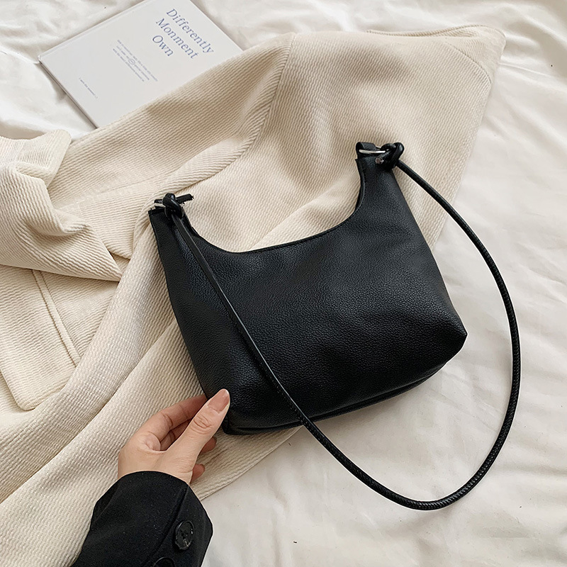 Bolso de diseño de nicho para mujeres este año, sensación de alto nivel de super caliente, bolso de hombro de moda, textura de bolso de cubo