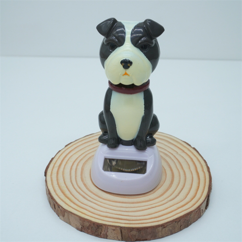 Adornos para automóviles cruzados, decoración para automóviles de resina, accesorios interiores para perros de palomitas de maíz para automóviles solares, sacudiendo la cabeza y llamando a la muñeca