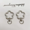 Silver (flower rotating spring buckle)