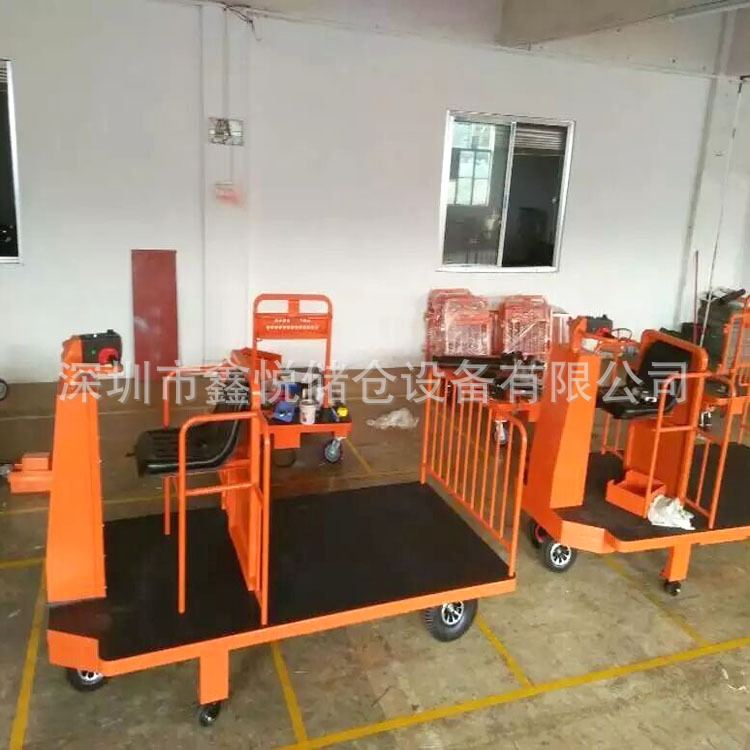 站驾式电动平板车 带护栏式行李电驱平板车 座驾式电动拖板车