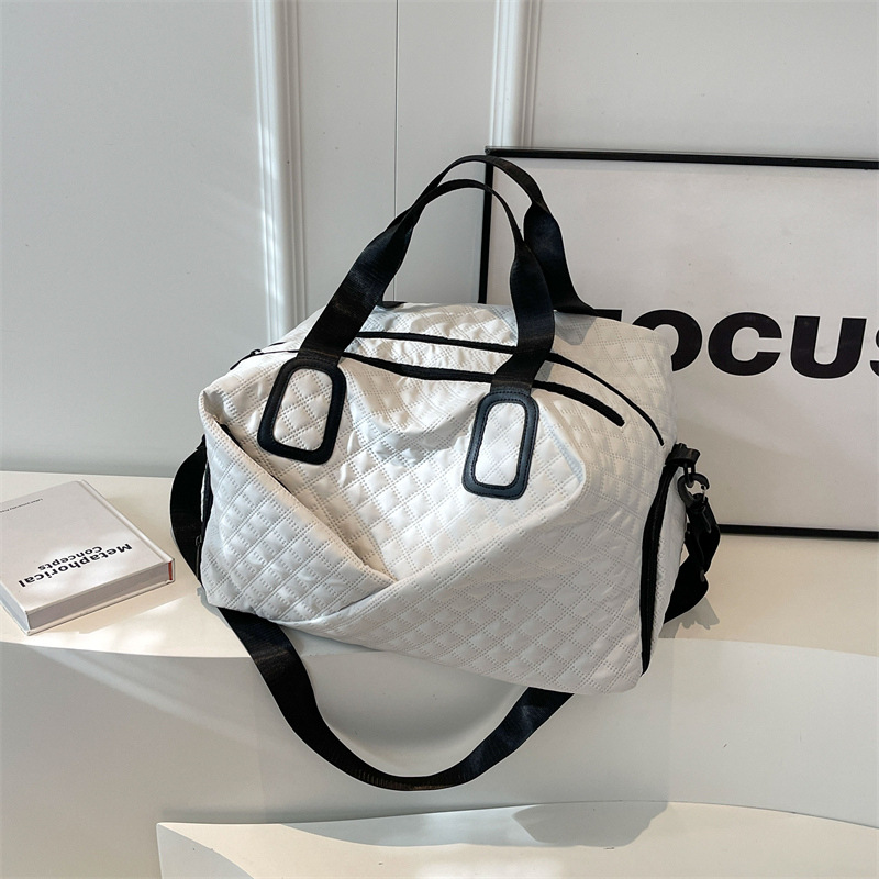 Bolso de mujer 2025 nuevo equipaje de viaje de gran capacidad, bolso de vacaciones de corta distancia de alta calidad.