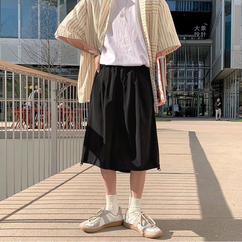 Pantalones cortos de traje de seda de hielo estilo Yamamoto japonés, pantalones cortos de pierna ancha de la marca de marea de verano para hombres, pantalones casuales sueltos por encima de la rodilla
