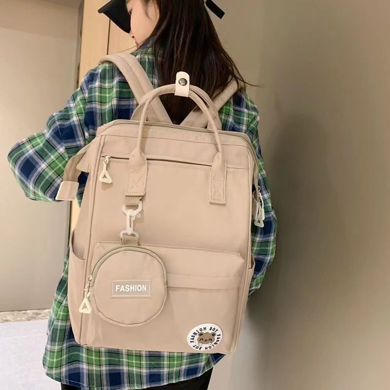 New cross-border Japanese and Korean style student backpack, solid color, simple casual travel backpack, college style, waterproof handbag