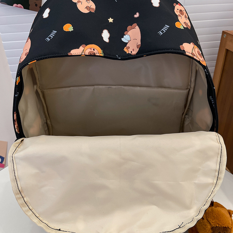 Nueva impresión de dibujos animados mochila infantil ocio versátil mochila de estudiantes de primaria y secundaria de gran capacidad mochila de estudiantes de secundaria