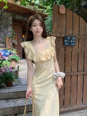 小飛袖ワンピース女装夏の新作黄色の花のスカートは腰を収めてやせています。