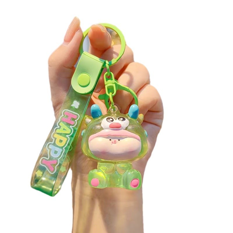 Caricatura Lilith dragón lindos colgantes de resina transparente bolsos de automóviles colgantes de llaves al por mayor