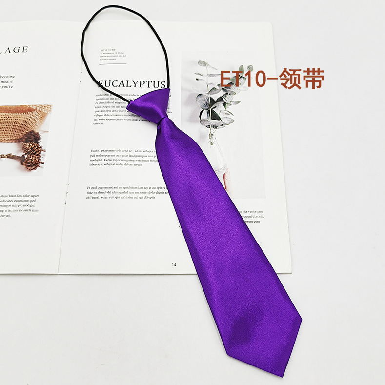 Spot de fábrica al por mayor conjunto de pajarita de corbata para niños de escuela primaria, corbata a rayas de color sólido, pajarita de raíz de plumas