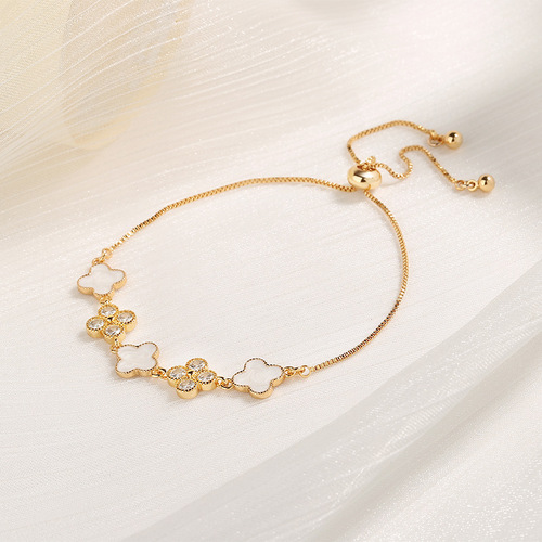 Live broadcast lucky four-leaf clover champagne gold bracelet for women, light luxury fashion imitation mother-of-pearl glue pull-down adjustment bracelet