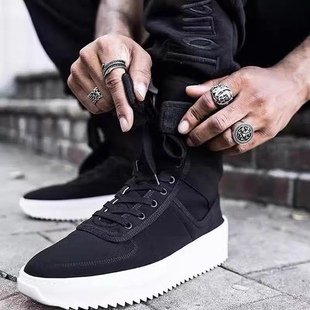 The Independent Fog Military Boots Are Black as the Main Color with White Thick Soles, Side Zipper Design, and Exquisite Workmanship.