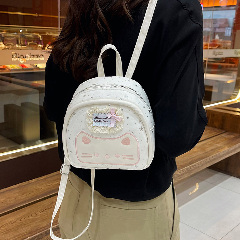 2026 nuevo gatos bordados mochila rosa brillante estrella mini mochila de la niña viento lindo jardín de infantes mochila pequeña