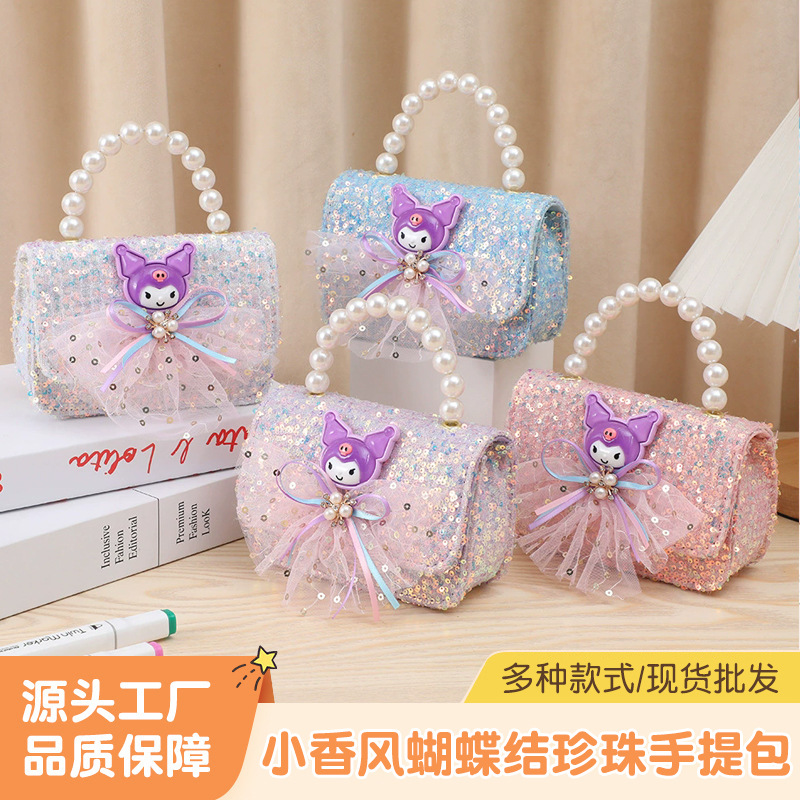 Bolso infantil de dibujos animados, pequeño bolso de mano estilo Chanel con lazo y perlas, monedero de princesa Kuromi para niña pequeña.