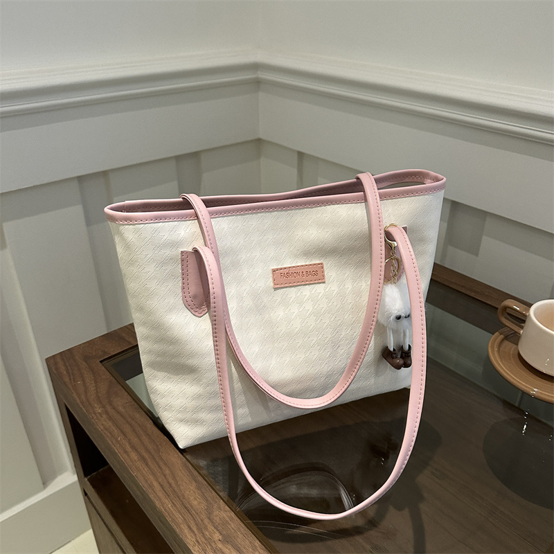 Bolso de mano de viaje al trabajo 2024 primavera nuevo bolso de ocio universal bolso de hombro brazo bolso de mano coreano