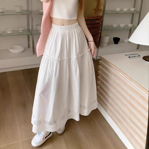 White lace-trimmed half skirt with A-line large hem, loose-fitting high-waisted, suitable for summer with French style.