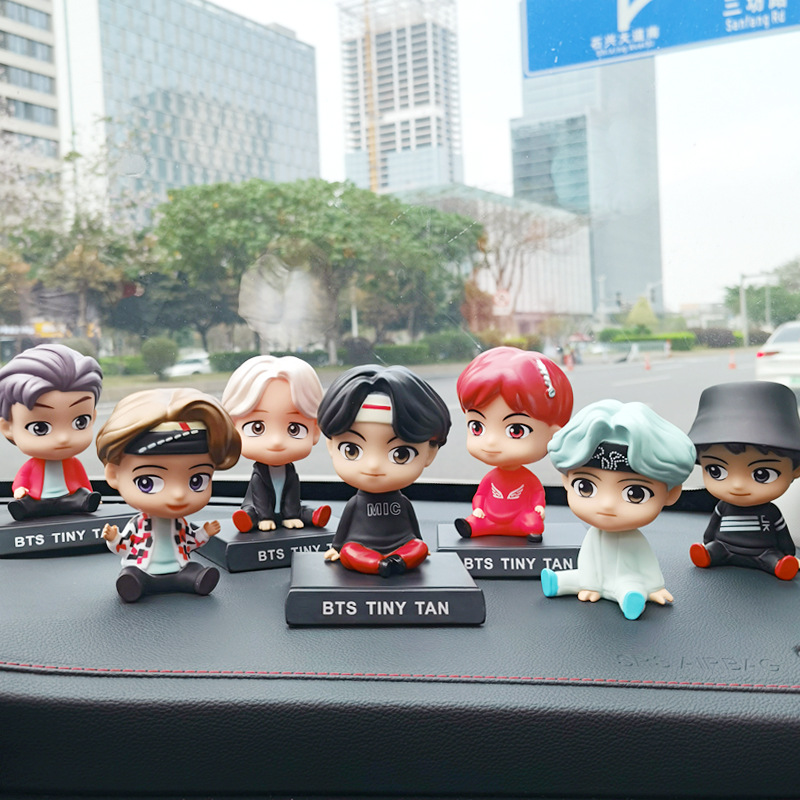 BTS, the iconic boy band from South Korea, merchandise, collectible figure, head-bending action figure, car accessory, decorative item