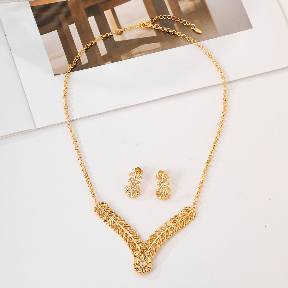 Europa y los EE.UU. collar de auriculares de bronce para mujeres joyas de piedra de zinc de moda de dos piezas de joyas elegibles transfronterizas