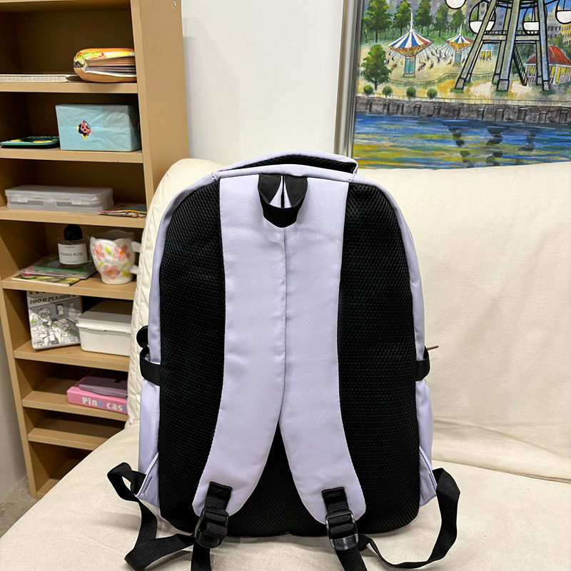 Nueva versión coreana pequeña mochila fresca de nylon de gran capacidad mochila de estudiantes de secundaria secundaria de alto valor de la cara mochila casual