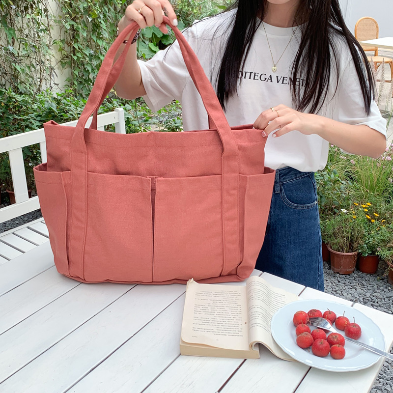 Estilo coreano casual color sólido Internet celebridad moda bolsa de tela simple moda de gran capacidad todo fósforo de las mujeres solo hombro bolsa de lona