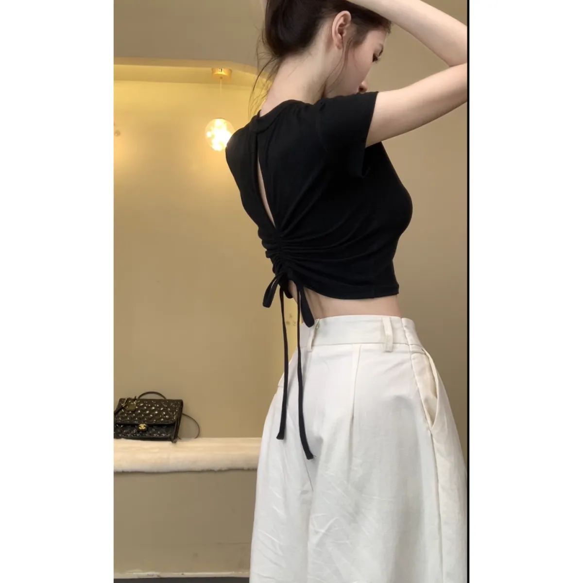 Unique niche design, slim-fitting high-waisted short-sleeved t-shirt, sexy and alluring style, back cutout drawstring, Instagram-worthy top for women.