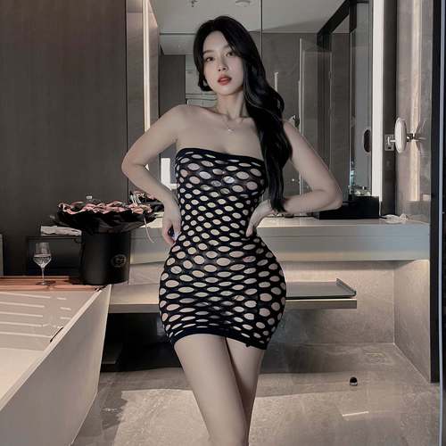 Plus-size women's flirtatious fishnet bodysuit with a tearable crotch—sexy, hollowed-out full-body black silk look that exudes pure allure.