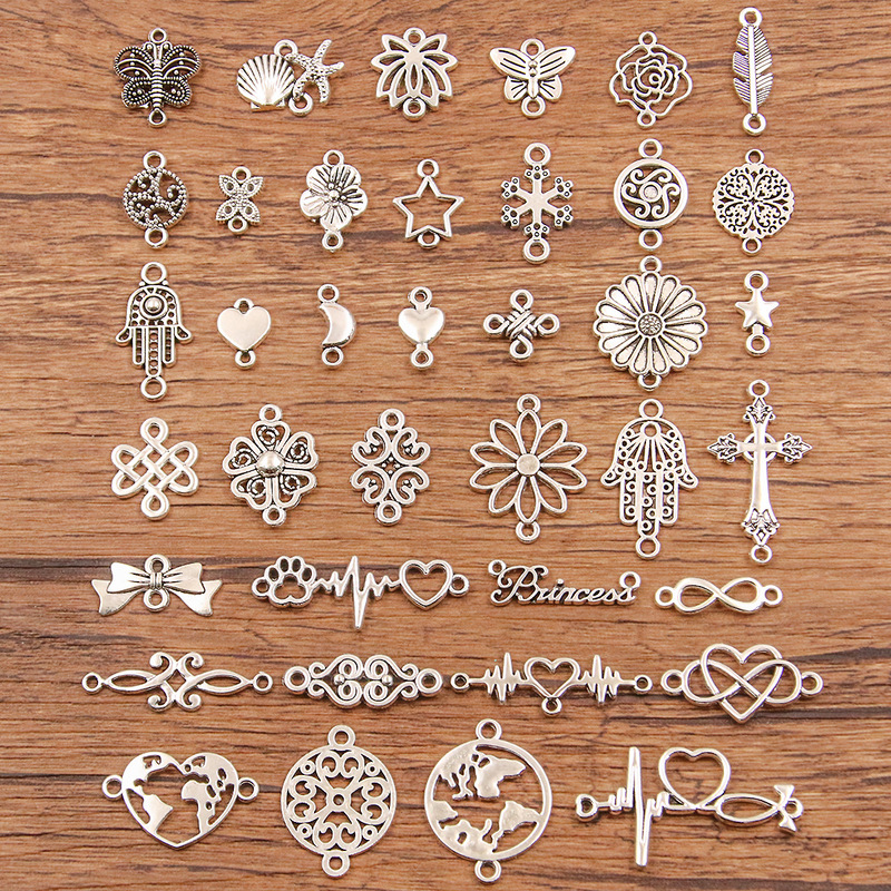 A variety of cross-border plant animal connector geometric hollow butterfly leaves snowflake palm flower charm A variety of cross-border plant animal connector geometric hollow butterfly leaves snowflake palm flower charm