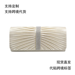 Elegant European and American-style evening bag with pleated design, rhinestone accents, and crystal diamond details&mdash;perfect for weddings and formal events.