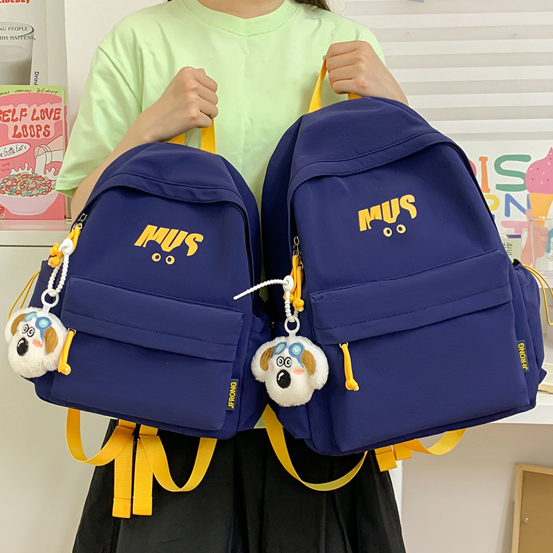 初高中学生书包男女生时尚大容量旅行双肩包简约轻便校园背包新款