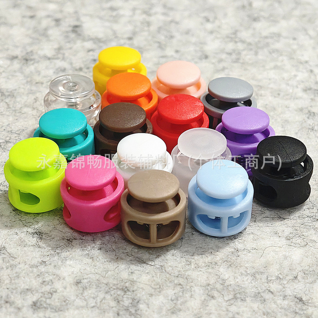 Botón de resorte de color botón de nariz de cerdo de doble agujero de plástico ajustable botón de pan antideslizante cilíndrico botón de cuerda de campana colgante de color sólido