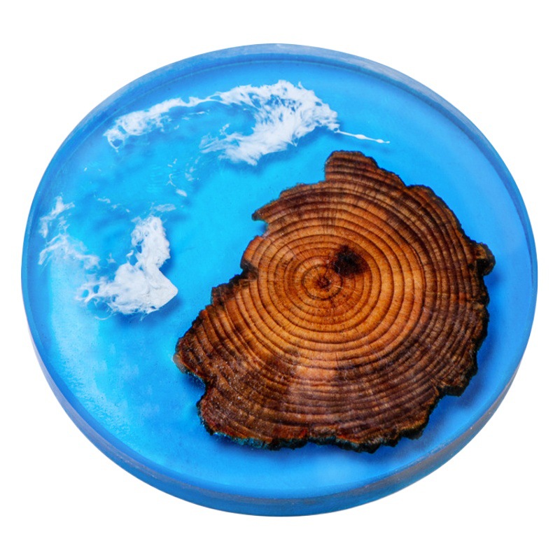 Cruz-frontera norte de pino epoxi resina río montaña azul estera de aislamiento olla teniendo madera maciza Zen onda titular de la taza