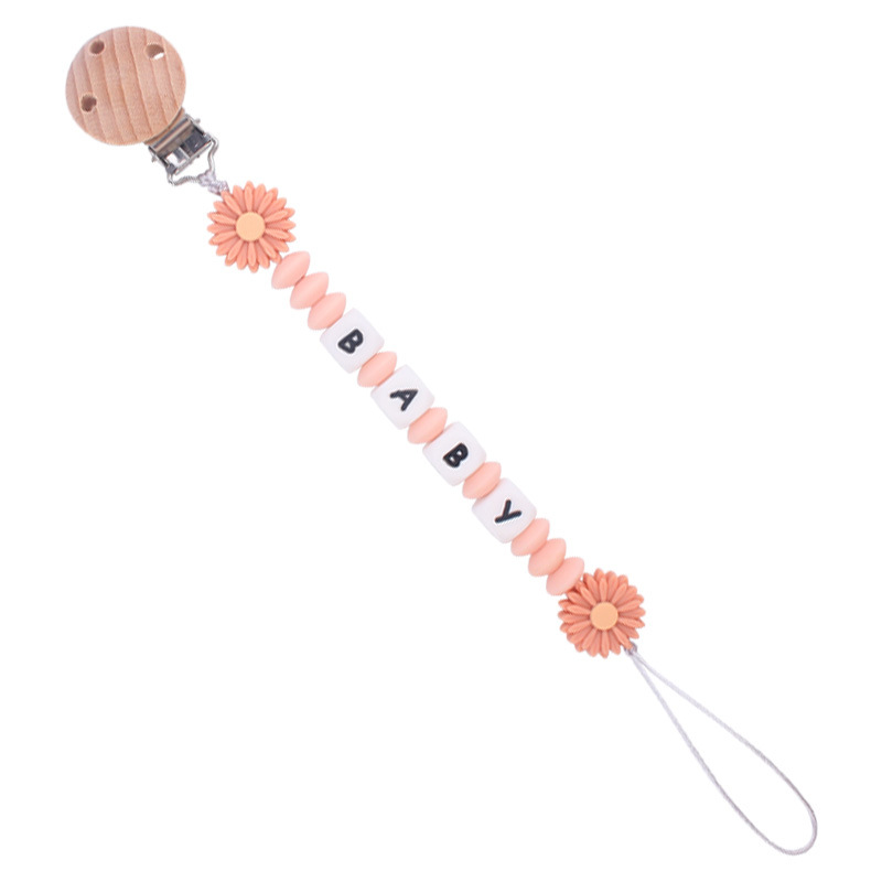 Nuevo bebé suministros de dibujos animados margarita teether creativo bebé DIY mordedura molar pezón cadena anti-gota cadena