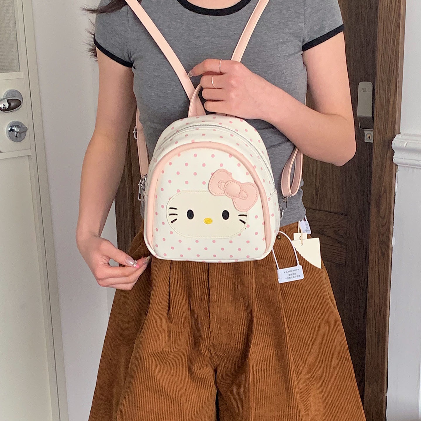 Cat2026 viento de verano mochila de chicas mini mochila encantadora para mujeres punto de onda diario púrpura versátil nuevo