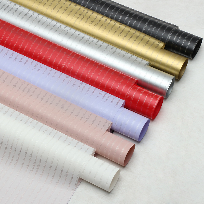 Huaxi pequeño inglés papel hansu flor al por mayor papel de embalaje ramo material de embalaje impermeable niebla material de florista