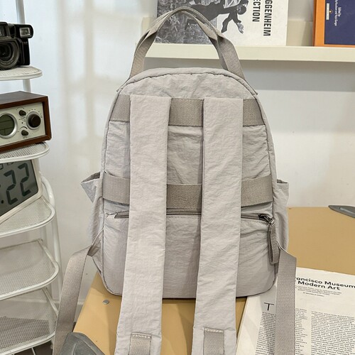 Korean simple all-matching backpack, female college student schoolbag, light commuting computer bag, female traveling backpack