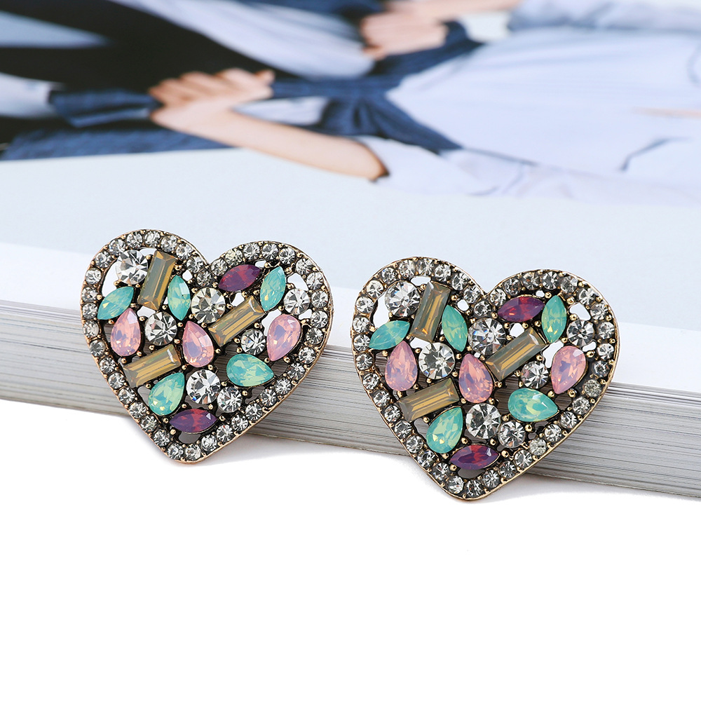 1 Pair Simple Style Heart Shape Glass Plating Women's Ear Studs display picture 5