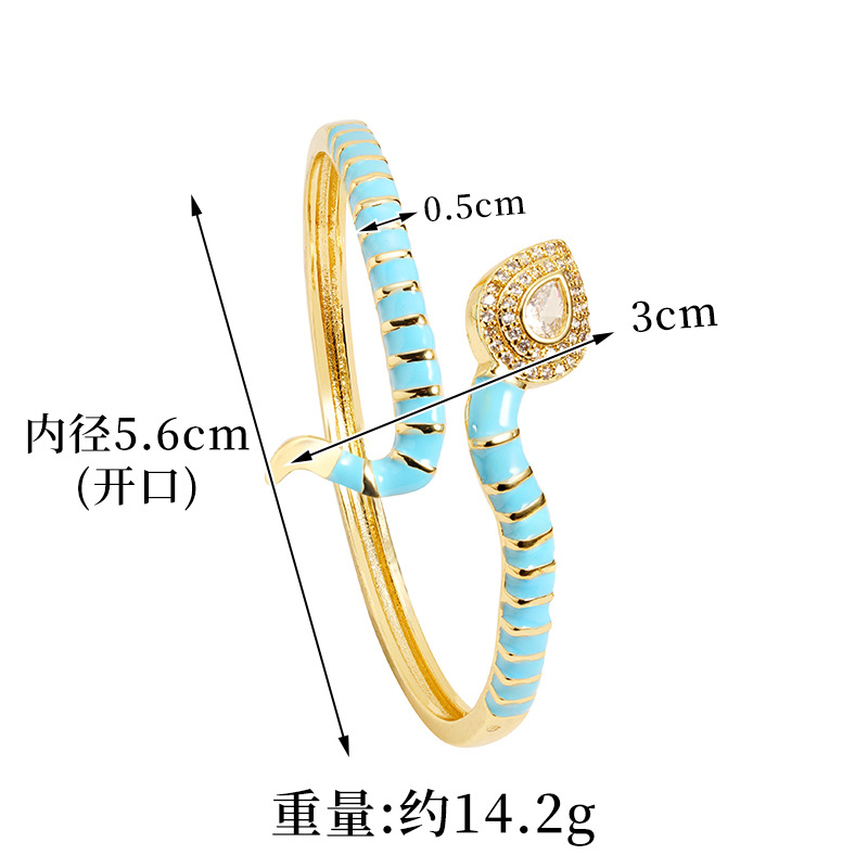 Brazalete de oro galvanizado de arena transfronteriza de 18k esmalte de color universal cabeza de serpiente de micro-pantalón anillo de piedra abierto joyas de estilo europeo y americano