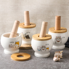 漫画の猫の陶磁器の缶のニンニクの泥の神器の臼のニンニクの家庭用のニンニクの粉砕器の粉砕器の薬の缶のニンニクの缶の杯をつぶします。