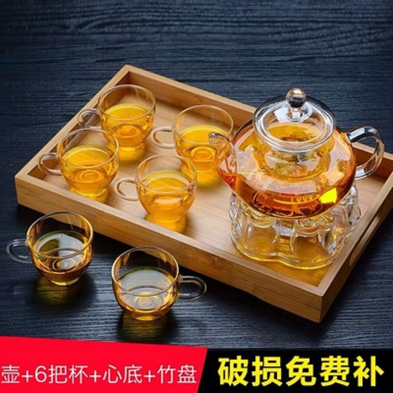 Fábrica al por mayor engrosada vidrio borosilicato flor tetera traje de alta temperatura resistente vidrio tetera filtro Kung Fu juego de té