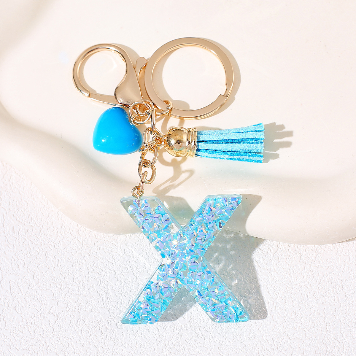 Nuevos productos azules de amor con frascos de letras lindos enclavadores decoraciones europeas y americanas populares llaveros damas