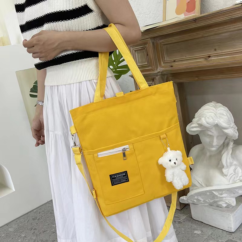 Bolso de lona de un solo hombro coreano para mujer multiusos ins Mochila de almacenamiento para estudiantes universitarios de moda