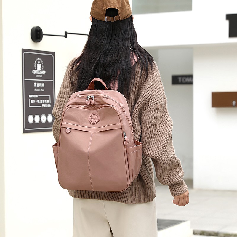 Nueva mochila de gran capacidad para mujeres en primavera de 2025 versión coreana de la mochila estudiantil anti - salpicaduras de agua mochila de viaje