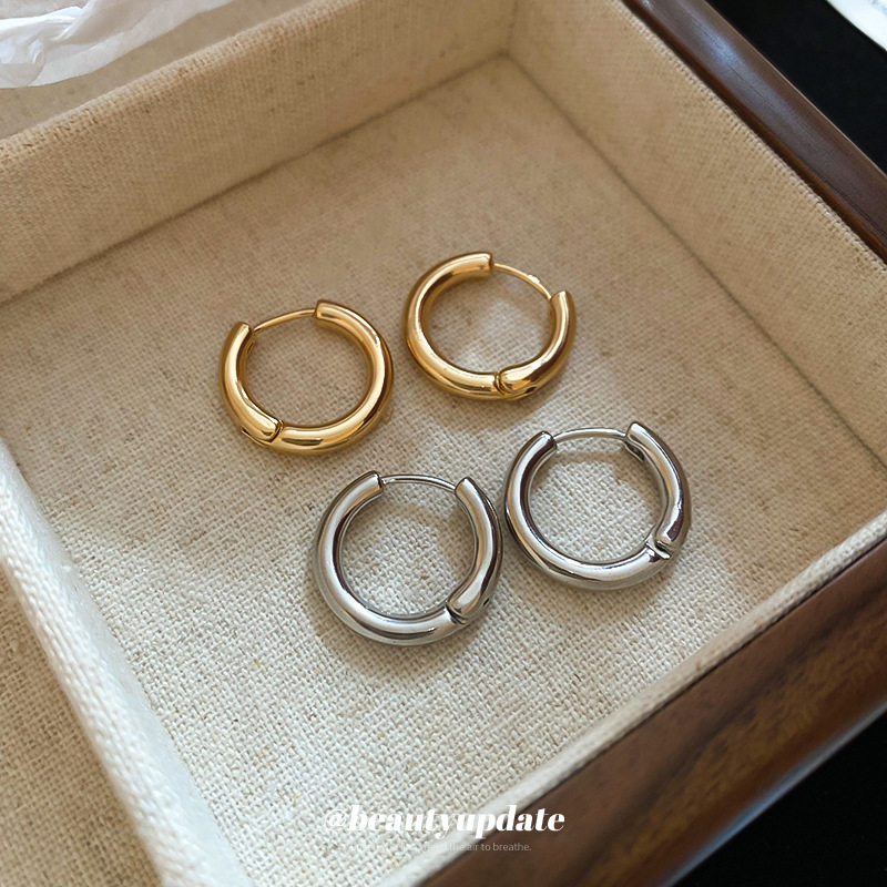 Pendientes brillantes redondos de lujo ligero europeos y americanos Pendientes de temperamento de moda retro Pendientes de todo fósforo de personalidad femenina