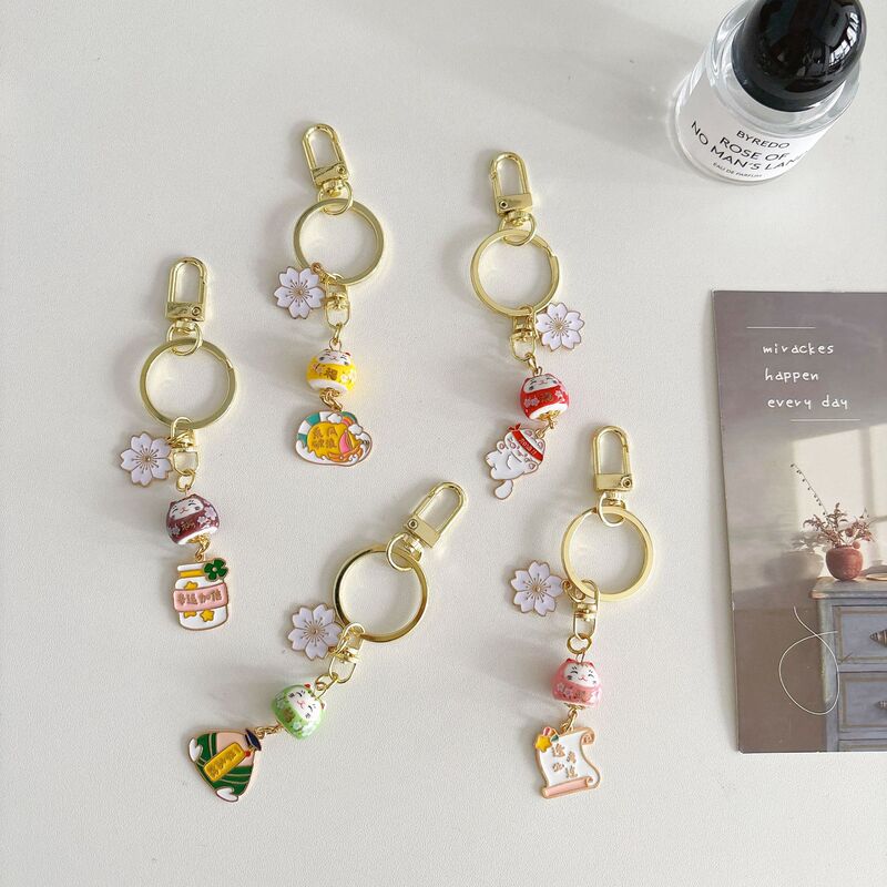 J1033 Lucky White Flower Cat Ceramic Lucky Cat Keychain Sand Gold Hanging Decoration Blessing Language Students Graduation Season Gifts