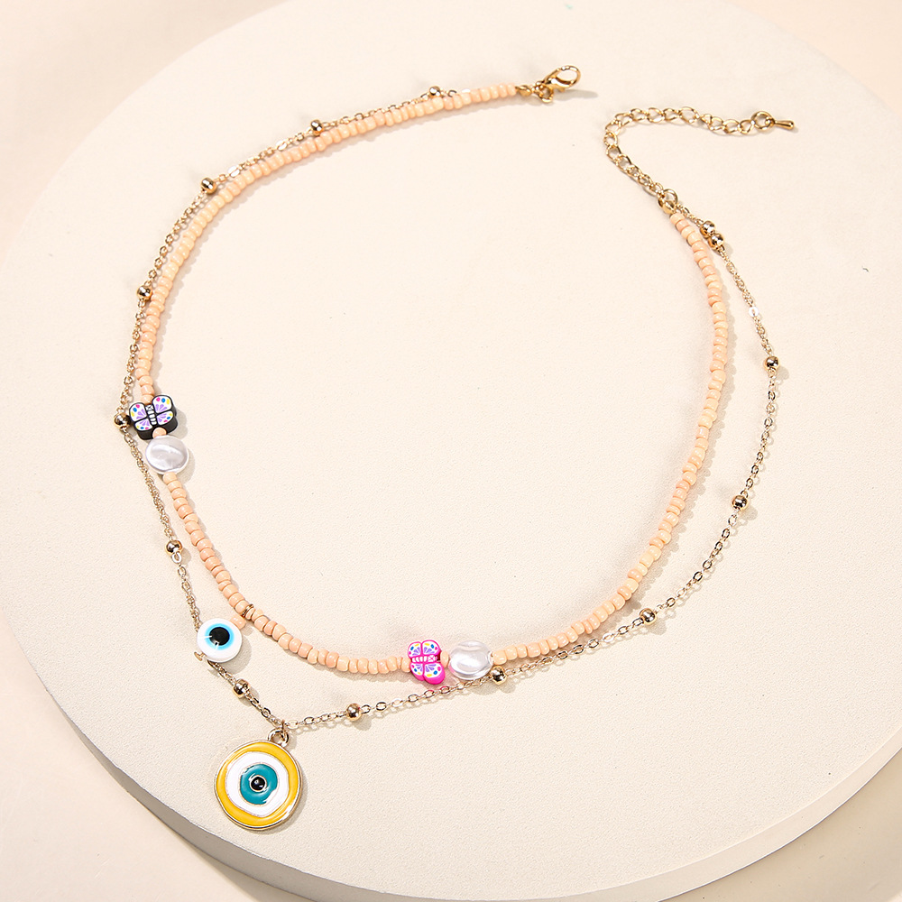 Ethnic Double-layer Devil's Eye Pendant Metal Pearl Clavicle Chain Wholesale display picture 5